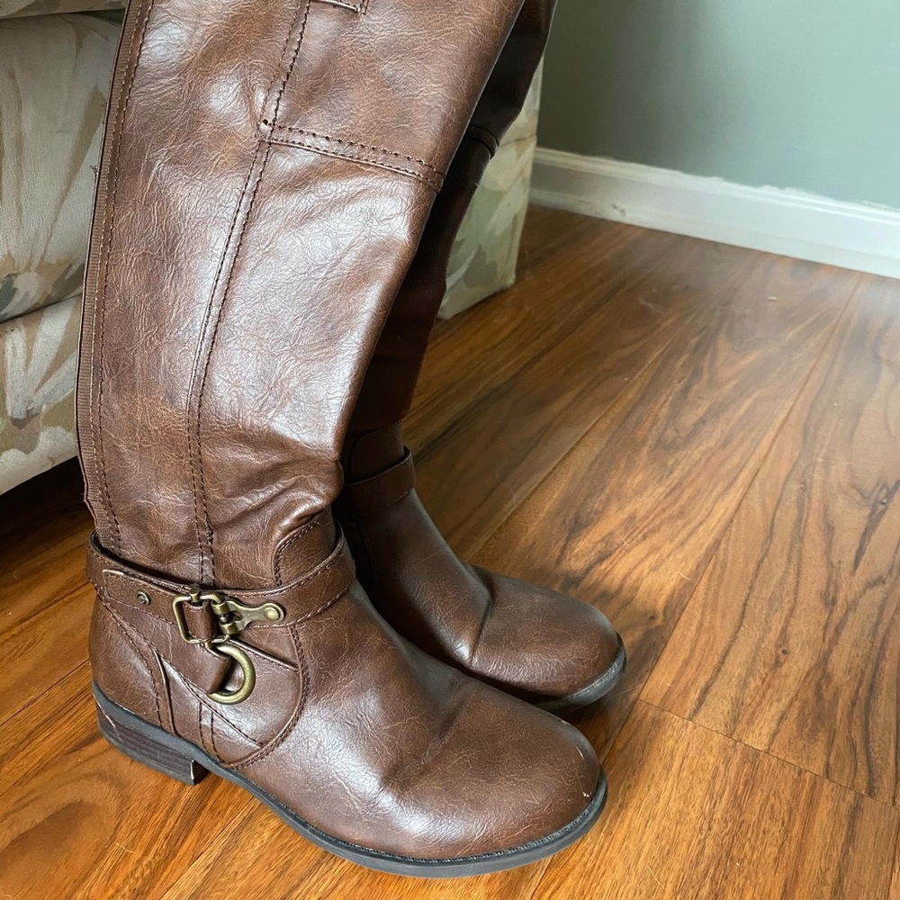 Tall brown boots with buckle detail!